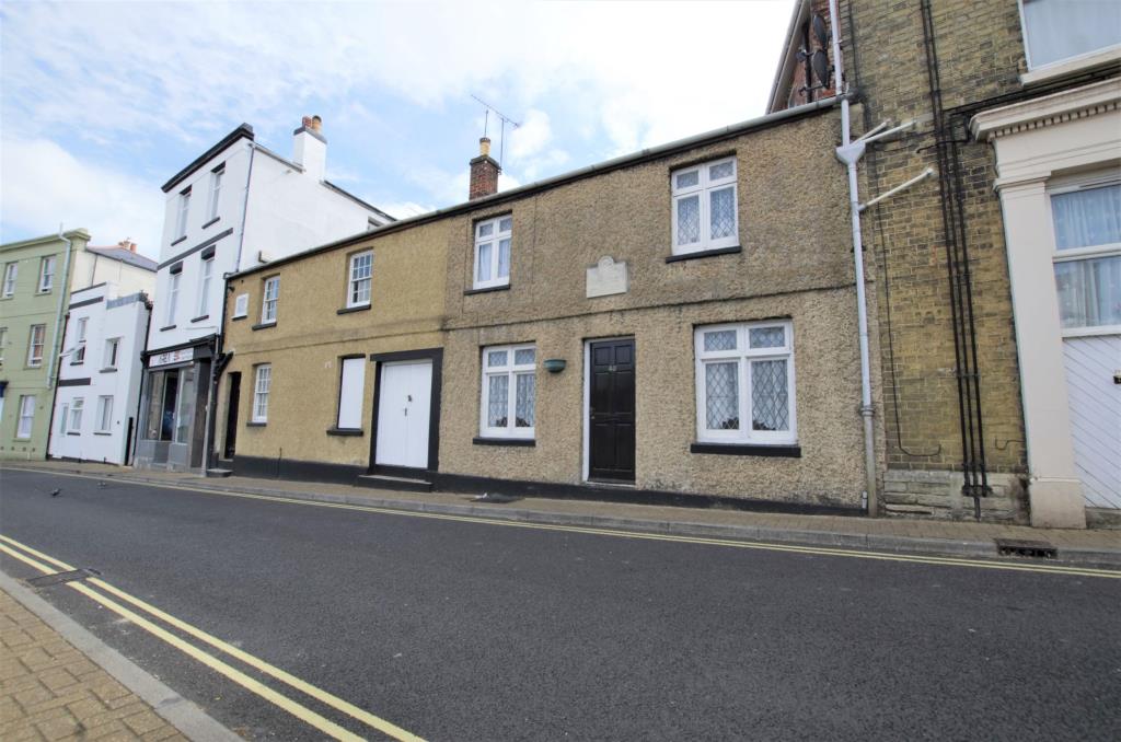 Lot: 73 - PAIR OF COTTAGES WITH CENTRAL STORE - Front photo of Castle Street Ryde Isle of Wight